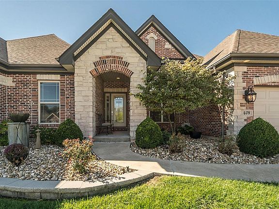 The Entry features Stone column that join with a soft arch of brick and stove that vaults to the gable.  You can see in the photos that the masonry work extends into all side of the recesses in the elevation, rather than simply having a the front surfaces with detail work.  If you look at the secondary gable to the right of the Entry, you will see that the vent area features stone keystones.