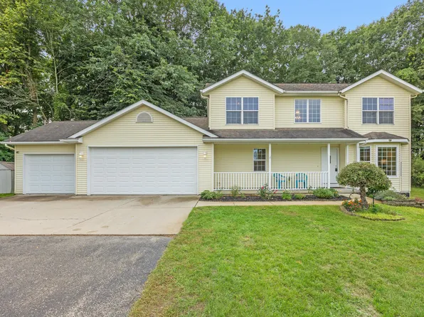 10169 Meadowgate Dr NE, Sparta, MI 49345