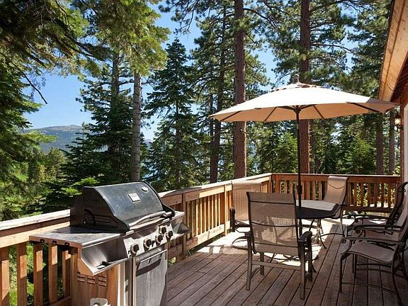 "Spacious back deck with views for your summer entertainment"