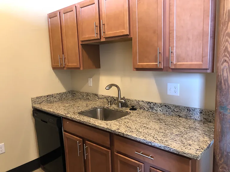 1 BR, 2 BR kitchen layout. Appliances include dishwasher, microwave, stove and refrigerator.