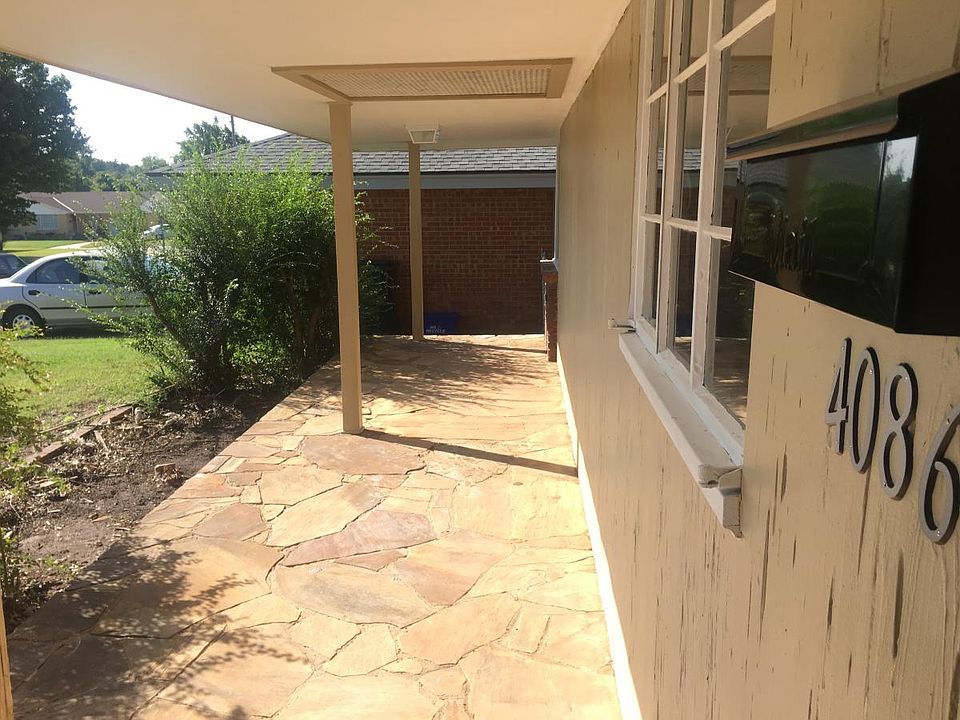Covered front porch facing East