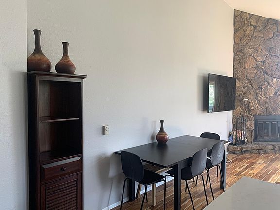 Open concept kitchen, dinning and living room, complete with beautiful hands wood flooring.