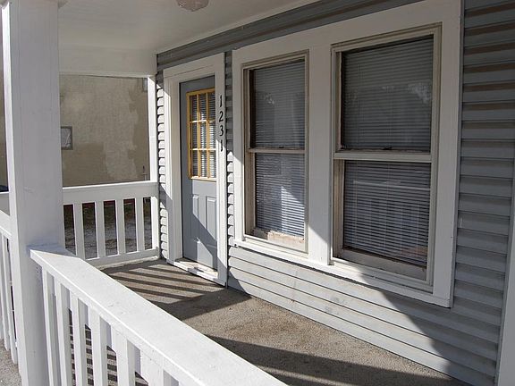 Front door has its own porch