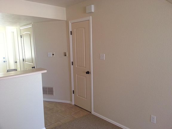 Kitchen/storage closet under stairs
