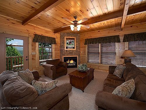 Living room with stacked stone fireplace