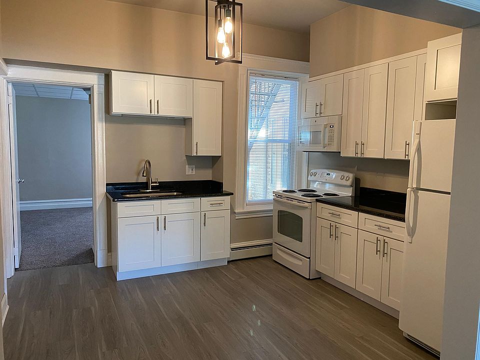 FABULOUS NEW KITCHEN WITH GRANITE COUNTERTOPS AND LUXURY VINYL FLOORING