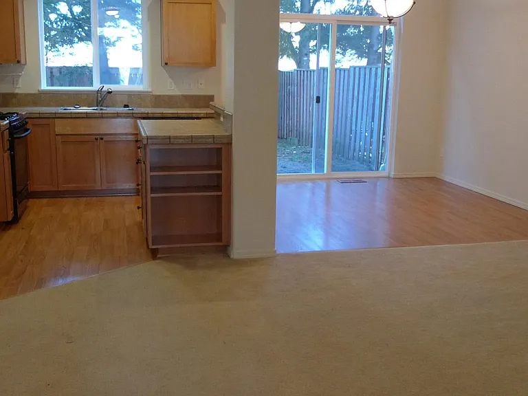 living room, kitchen and dining room combo view