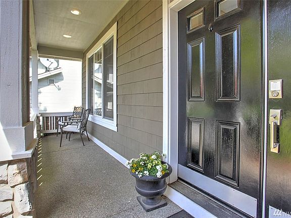 This front porch lends an air of welcome to this lovely home. 