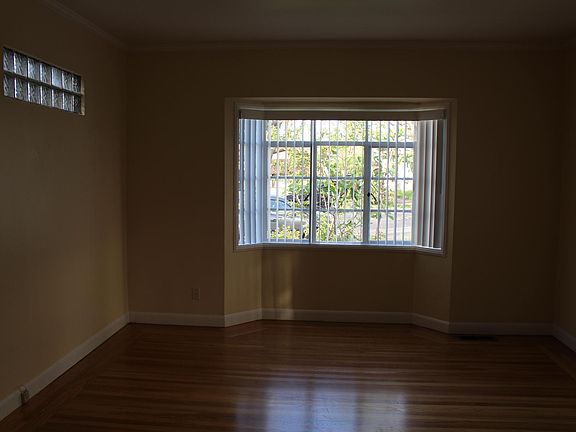 Main room, front of house and right side