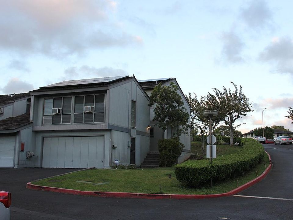 Two Car garage with new door; PV System on roof