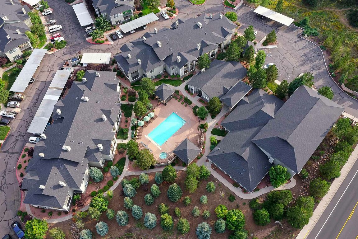 Experience upscale living in this beautifully landscaped apartment community, featuring a pristine swimming pool.