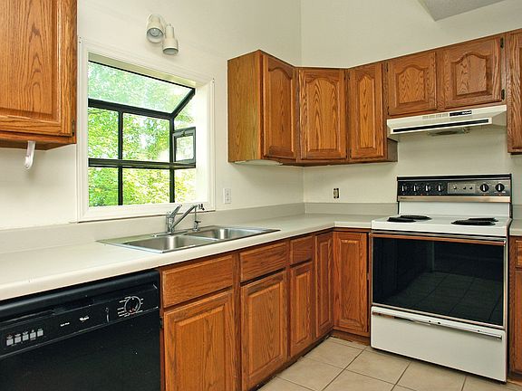 Kitchen with a vaulted ceiling