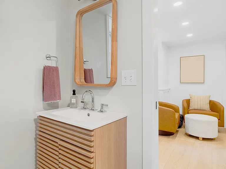 Lower level bath with shower.