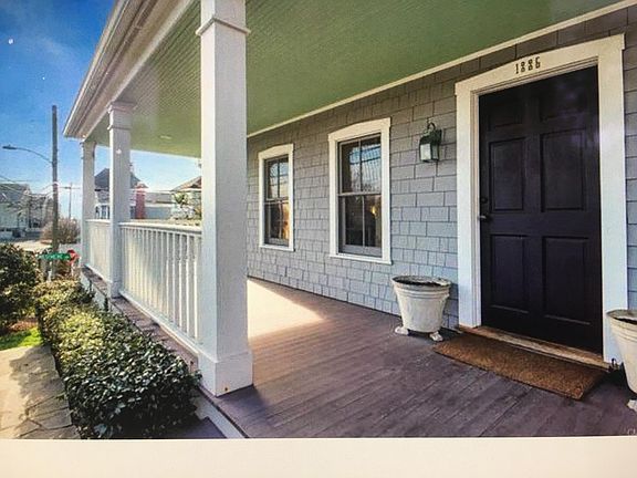 Front door and beginning of wraparound porch