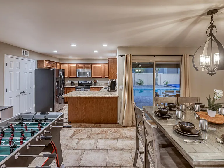 Direct backyard access from dining area _ perfect for indoor/outdoor entertaining.