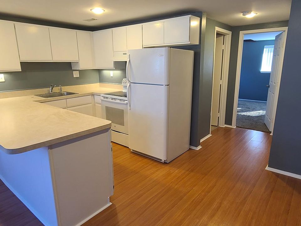 Kitchen and dinette/bar stool area