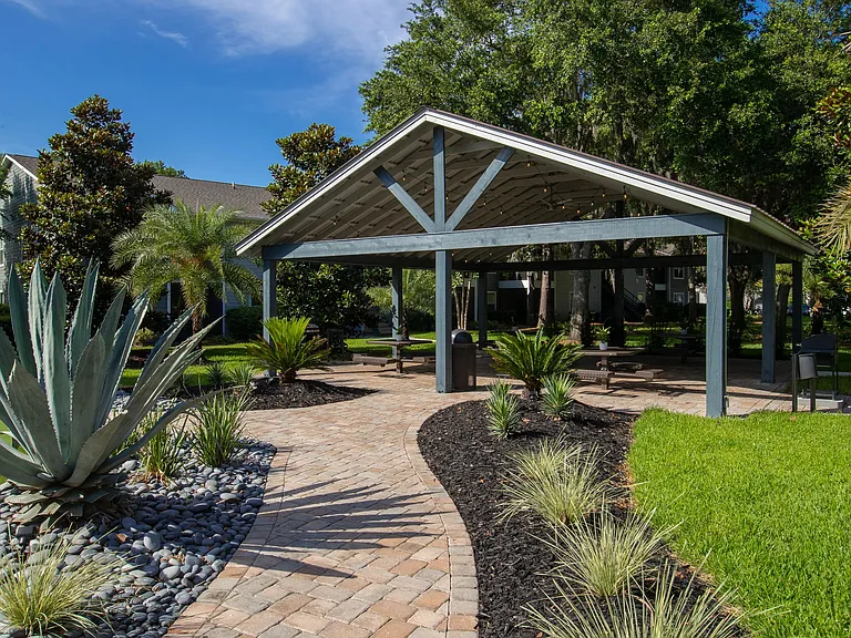 Follow the inviting paved pathway to the heart of relaxation at Emerson Islesour pavilion.