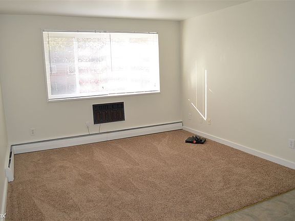 Natural sunlight pours into this apartment thru the large wi