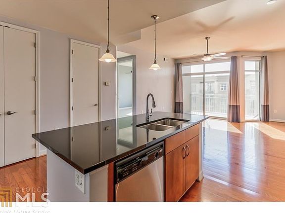 5th image of 711 Cosmopolitan Dr NE Unit 416