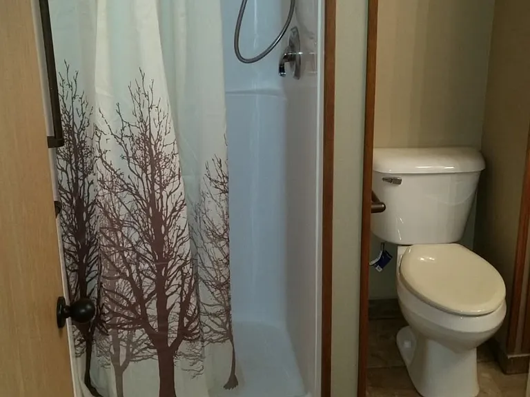 Heated Ceramic Tile in bathroom with shower.