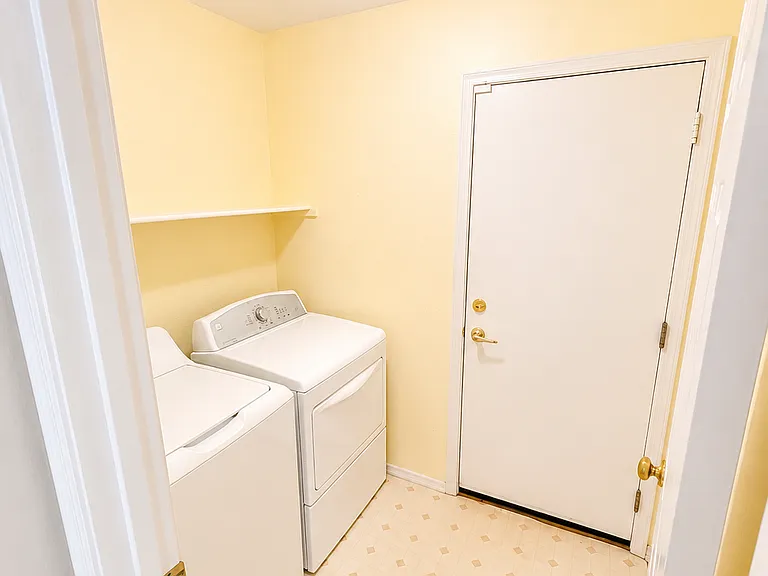 Laundry room including the washer and dryer.