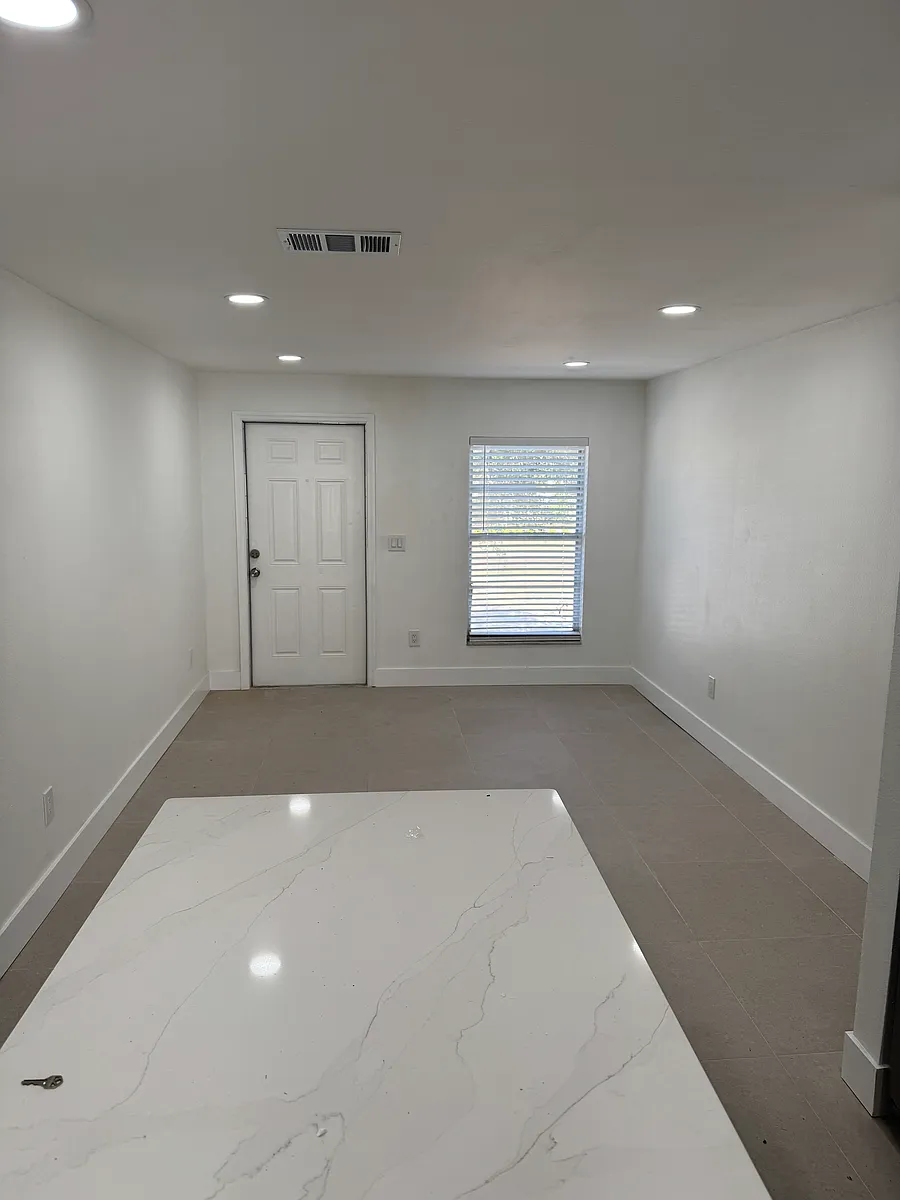 View from kitchen of front door and family room - 208 N Westland Ave #D