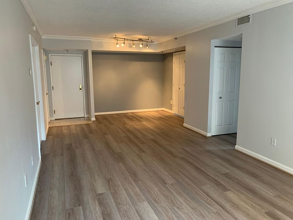 Living room/ dining area in back
