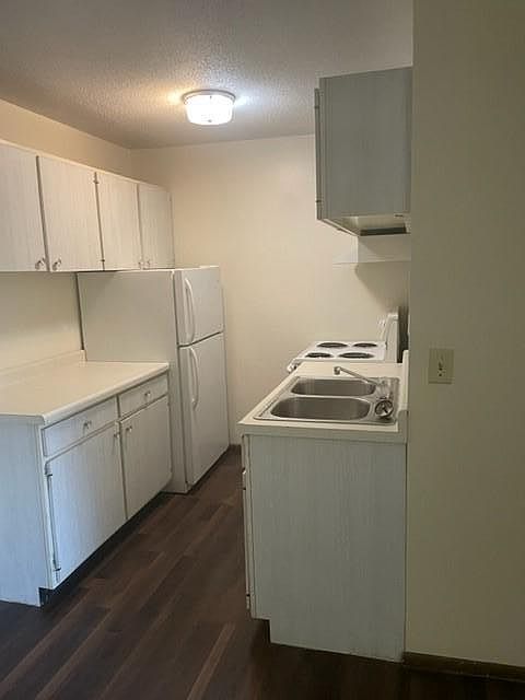 Kitchen with new flooring and counters