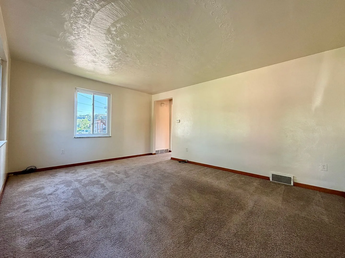 Charming Two Bedroom Townhome with a Private Basement & a Shared Backyard Space! Call Today! — Photo 4