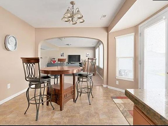Dining area between living room and kitchen