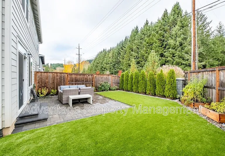 5587 NW Torchcrest Pl — Photo 19