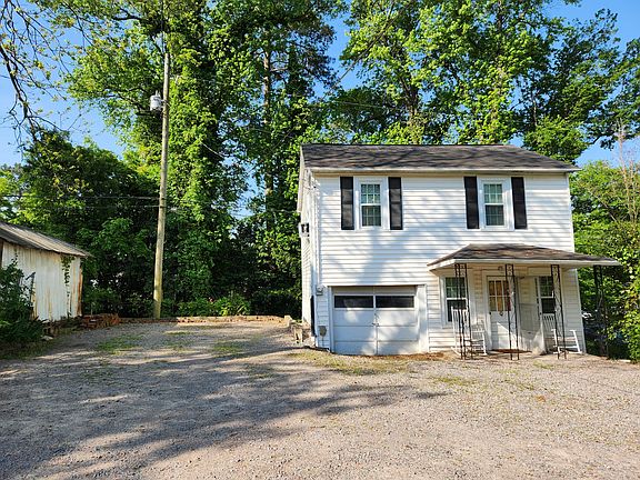 Bullshack tenants share back parking lot with (front) house tenants. Can also park on the street.