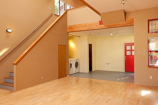 view of multi-purpose downstairs area and laundry