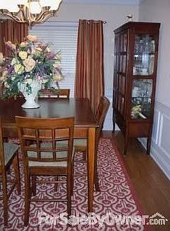 Formal Dining Room
						:
						with hardwood floors; view from kitchen