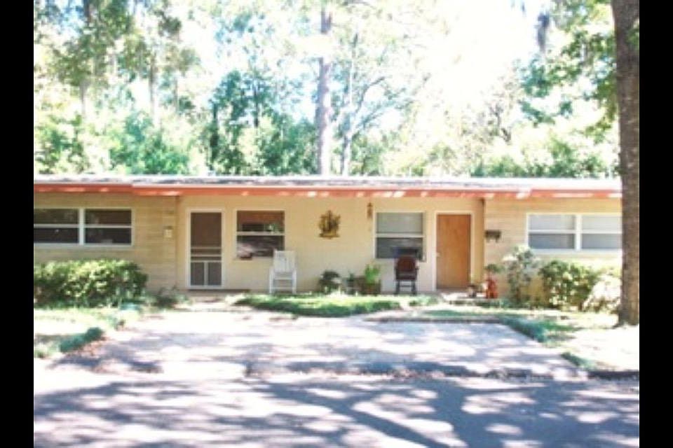 Front of the duplex in tree-lined Midtown.