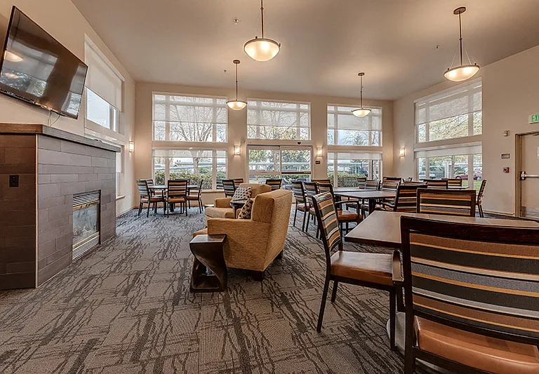 Large Social Room with Fireplace and Kitchen