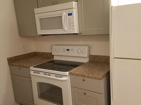 new counters, cabinets, sink, dishwasher, microwave