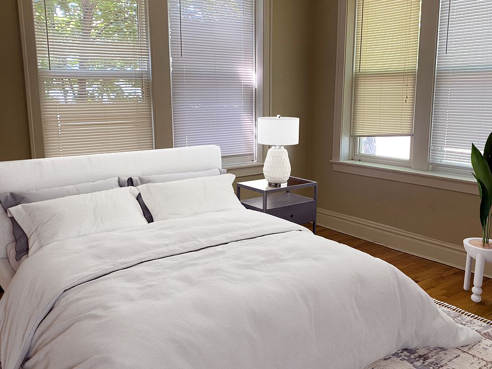 Sunny bedroom, virtually staged