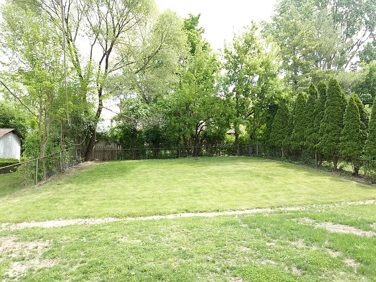 111 W Green Meadows Blvd — Photo 3