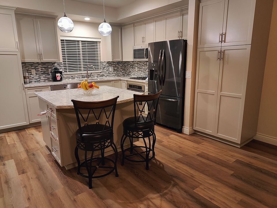 Kitchen- Large floor to ceiling pantry with convenient pull out shelves