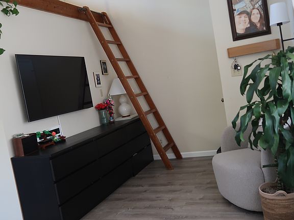 Ladder to Loft. room for gueen mattress and nightstand.