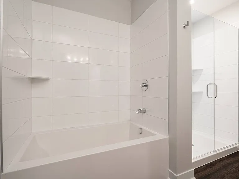 Select homes feature a free standing tub and shower.