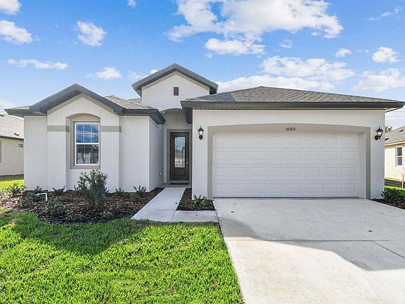 Juno new construction quick move-in new home plan french country elevation front view 5005 Emerald A