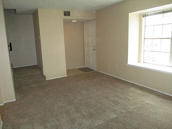Entrance door with Storm door. See tiled entry and guest closet to the left. Entry leads to large fo