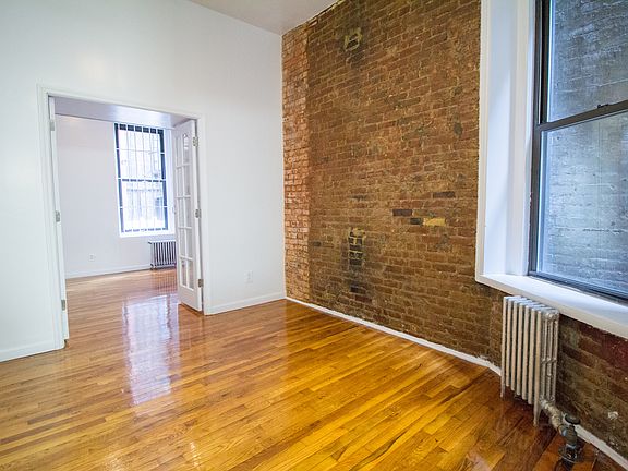 4th image of 217 E 10th St APT 3