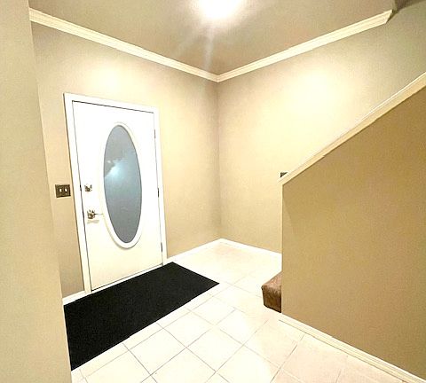 Large foyer/entrance with coat closet