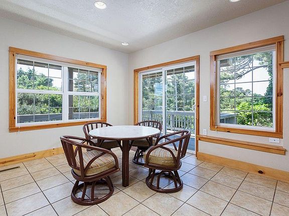 View from living room to dining area and deck.