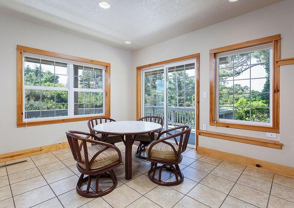 View from living room to dining area and deck.