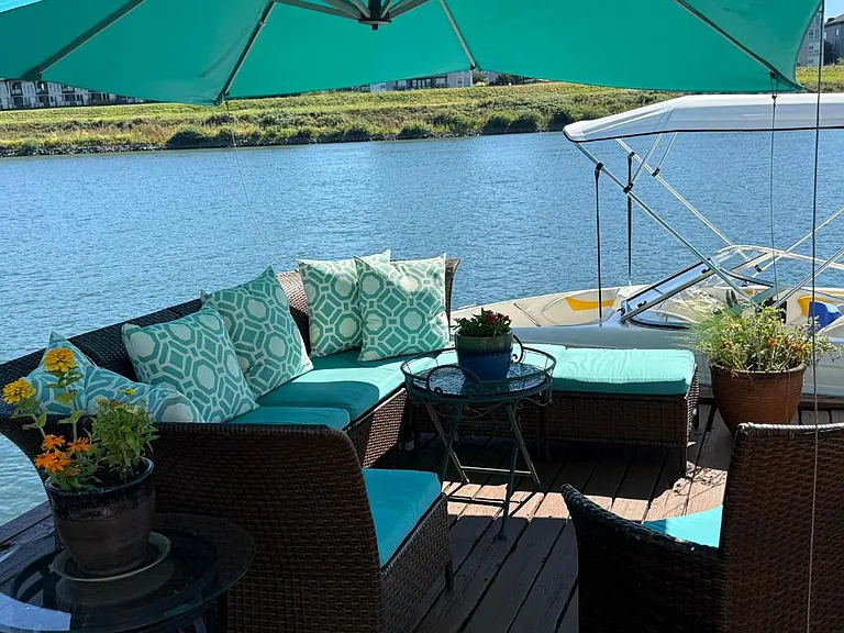 Seating under the umbrella.