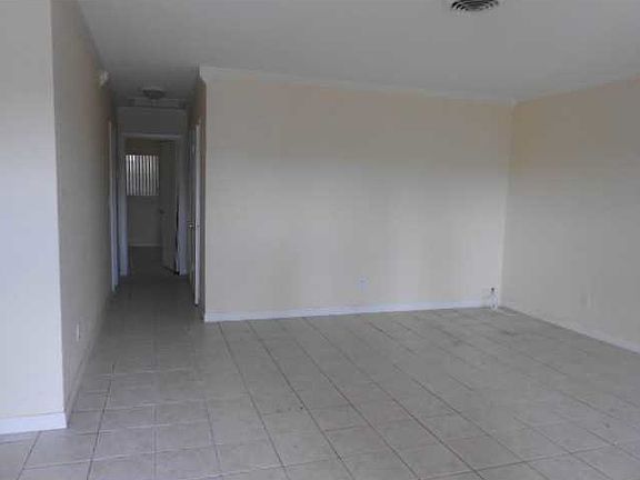 3rd image of 691 NE 46th Ct